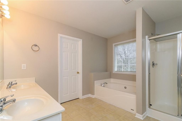 122 Melrose Creek Dr, Stockbridge, GA 30281 - bathroom featuring a bath, a shower stall, double vanity, and baseboards