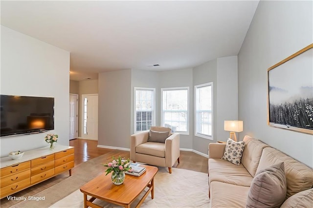 122 Melrose Creek Dr, Stockbridge, GA 30281 - living room featuring light wood-style flooring and baseboards