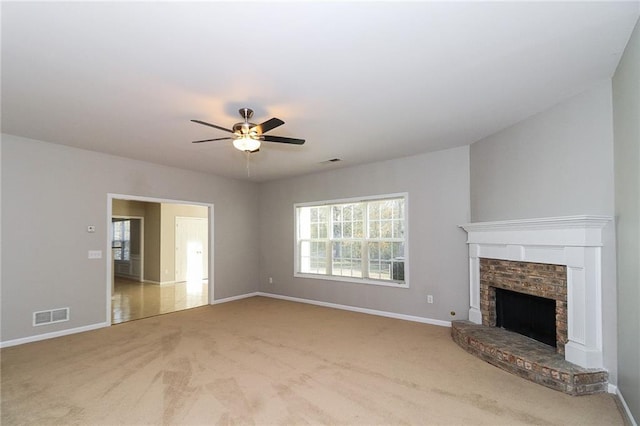 122 Melrose Creek Dr, Stockbridge, GA 30281 - unfurnished living room featuring carpet flooring, a ceiling fan, baseboards, and a fireplace