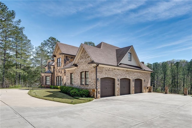 view of property exterior with a yard and a garage