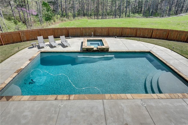 view of swimming pool featuring a yard and a patio area