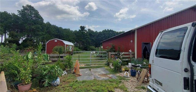 2268 Horse Farm Rd, Dewy Rose, GA 30634 - view of yard with fence and an outdoor structure