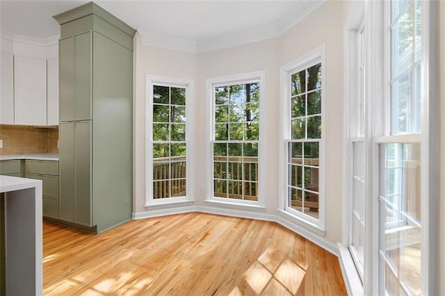 184 Corner Oak Ct, Waleska, GA 30183 - unfurnished dining area with light wood finished floors and crown molding