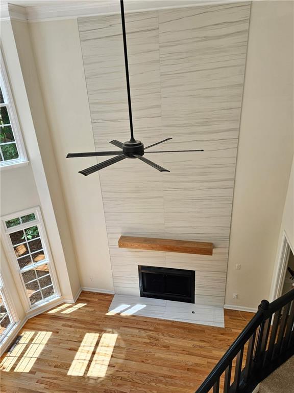 184 Corner Oak Ct, Waleska, GA 30183 - empty room featuring light wood-type flooring, crown molding, a chandelier, recessed lighting, and a raised ceiling