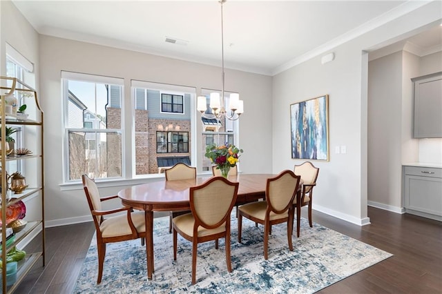 dining area featuring dark wood-style floors, visible vents, and baseboards