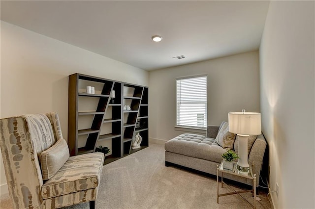 living area with carpet floors