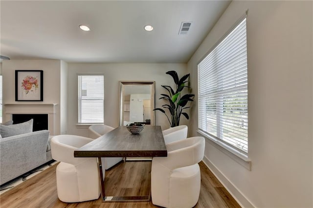 dining area with wood-type flooring