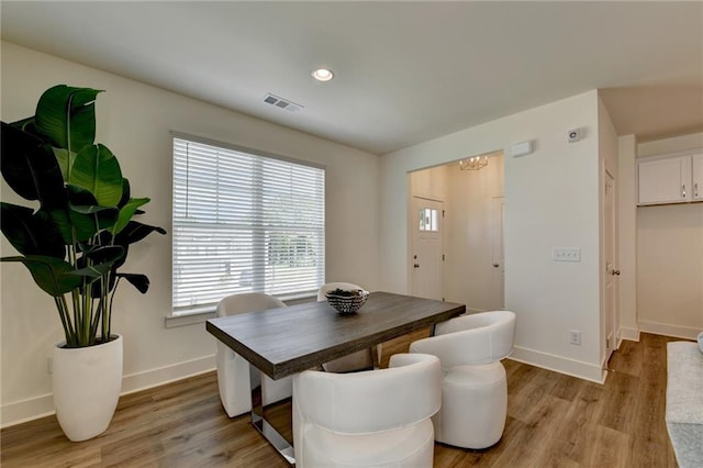 dining space featuring light hardwood / wood-style floors