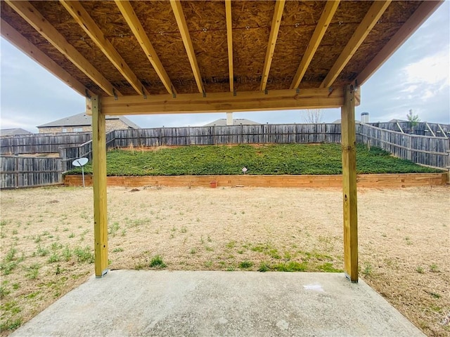 view of home's community with a patio area and a fenced backyard