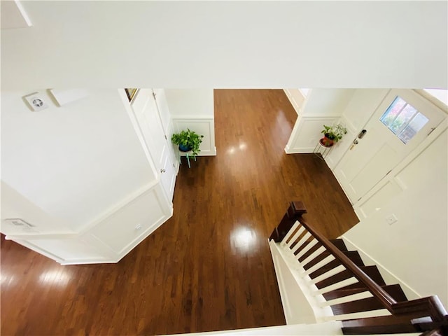 entryway with stairs and wood finished floors