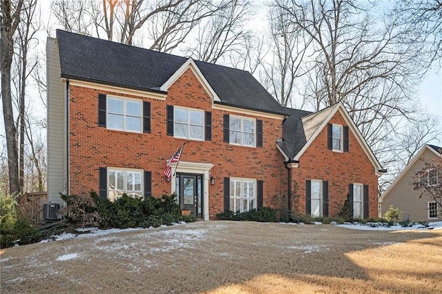 colonial inspired home featuring cooling unit