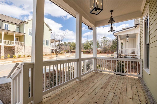 wooden terrace with a porch