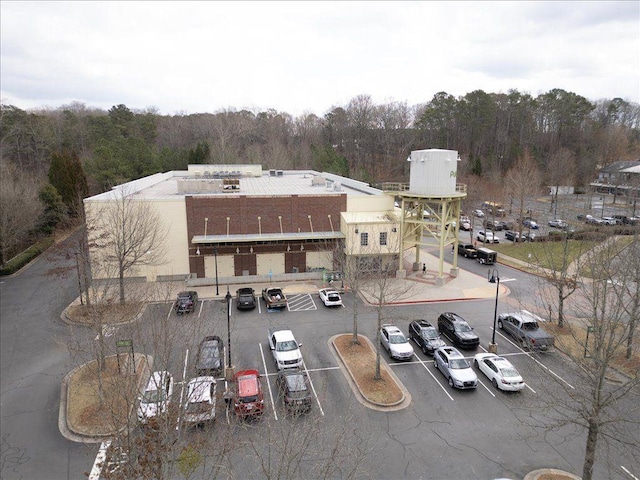 bird's eye view featuring a wooded view