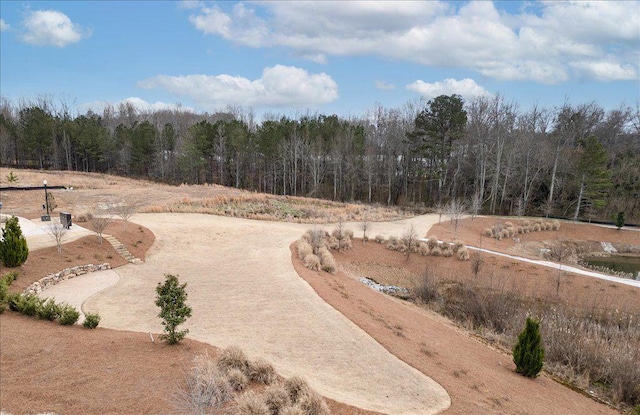 surrounding community with a view of trees