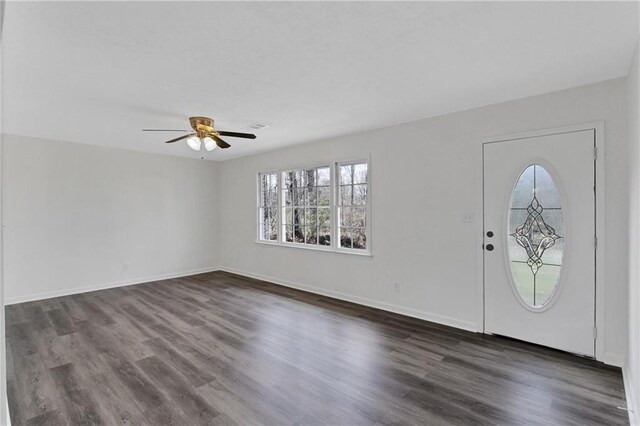 entrance foyer with dark wood-style floors, baseboards, and ceiling fan