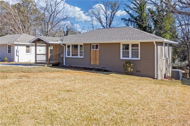 ranch-style home featuring a front yard