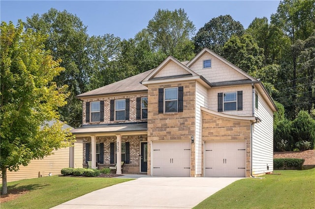 craftsman-style house with a garage and a front yard