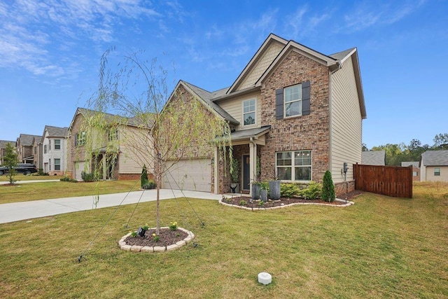 view of front of home featuring a garage and a front yard