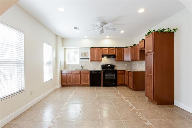 kitchen with light tile patterned floors, decorative backsplash, black appliances, and ceiling fan