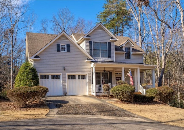 view of front of home with a garage and covered porch