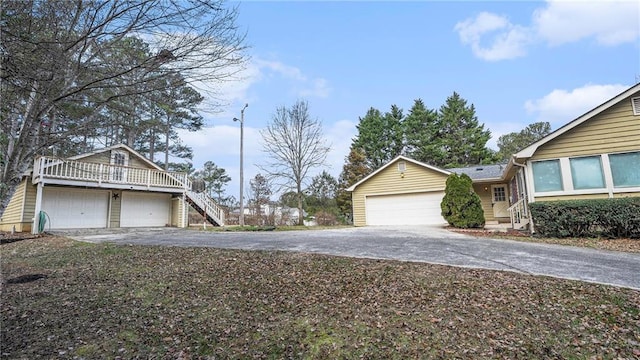 view of side of home with a garage