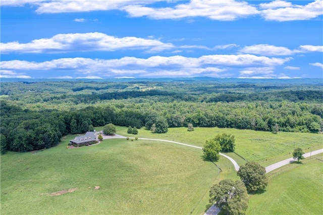 birds eye view of property with a rural view