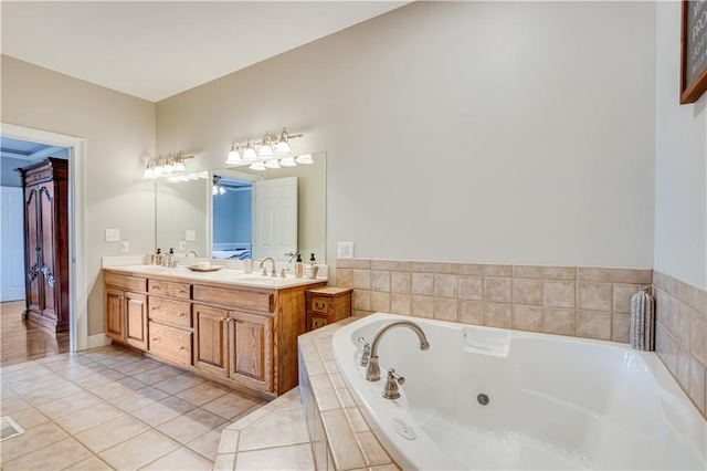 bathroom with dual bowl vanity and tile floors