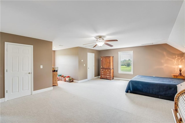 bedroom featuring ceiling fan and light carpet