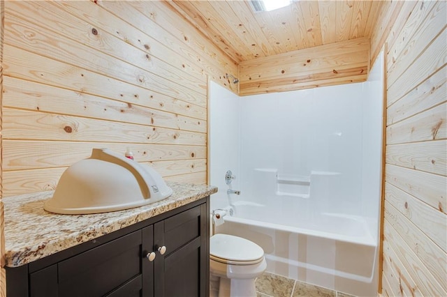 full bathroom featuring shower / bathtub combination, toilet, wood walls, and vanity