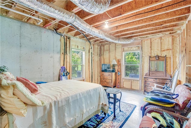 bedroom featuring multiple windows