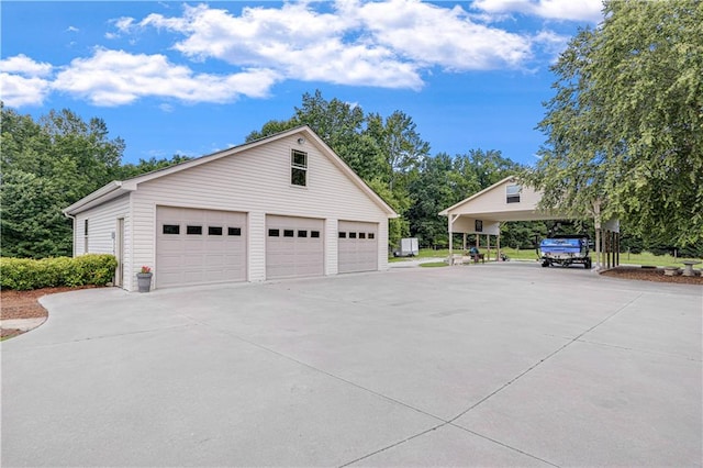 garage featuring a carport