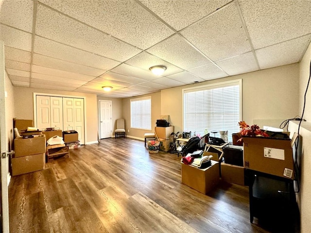 misc room featuring hardwood / wood-style flooring and a paneled ceiling