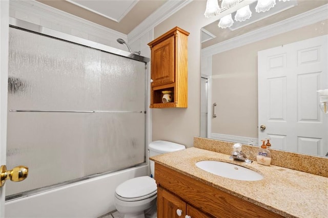 full bathroom with toilet, vanity, combined bath / shower with glass door, and crown molding