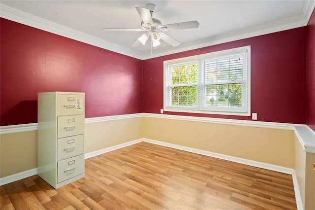 unfurnished room featuring ceiling fan, light hardwood / wood-style flooring, and crown molding