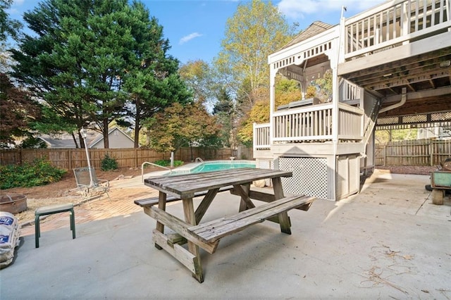 view of patio / terrace with a pool side deck