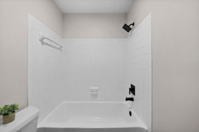 full bathroom with bathing tub / shower combination and toilet