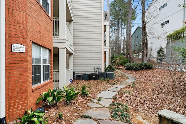 view of yard featuring central AC unit