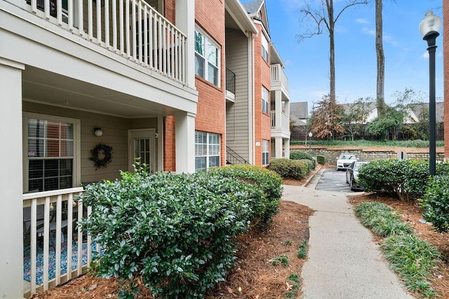 exterior space with brick siding