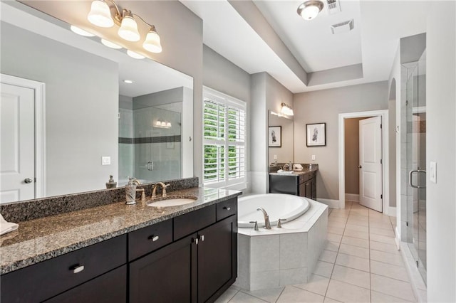 1393 Kings Park Dr NW, Kennesaw, GA 30152 - bathroom featuring a stall shower, two vanities, a bath, tile patterned floors, and baseboards