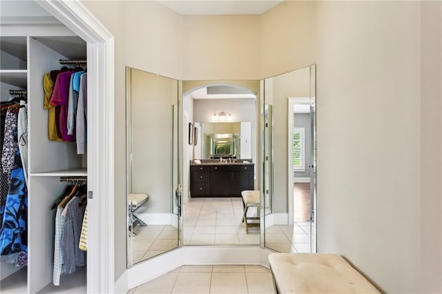 1393 Kings Park Dr NW, Kennesaw, GA 30152 - full bath with vanity, a spacious closet, and tile patterned floors