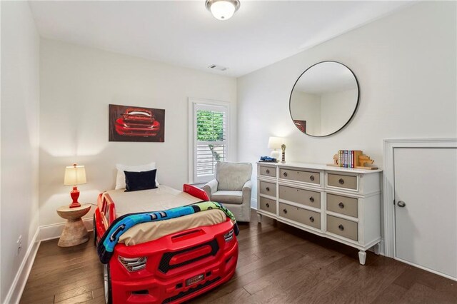 1393 Kings Park Dr NW, Kennesaw, GA 30152 - bedroom with dark wood-style flooring and baseboards