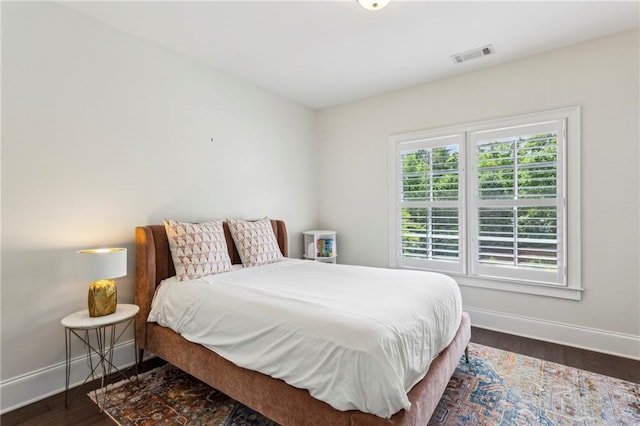 1393 Kings Park Dr NW, Kennesaw, GA 30152 - bedroom with baseboards and dark wood-style floors