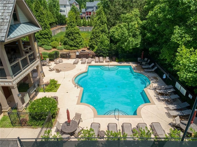 1393 Kings Park Dr NW, Kennesaw, GA 30152 - community pool with a patio area and view of scattered trees