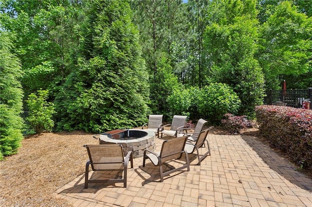 1393 Kings Park Dr NW, Kennesaw, GA 30152 - view of patio / terrace with an outdoor fire pit