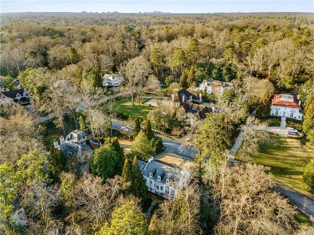 bird's eye view with a forest view