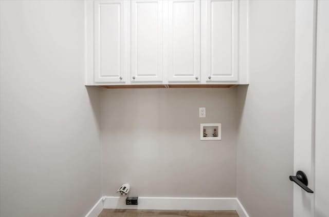 1950 Stethem Fry, Alpharetta, GA 30022 - laundry area with cabinet space, washer hookup, wood finished floors, and hookup for an electric dryer
