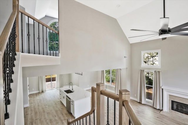 1950 Stethem Fry, Alpharetta, GA 30022 - staircase featuring high vaulted ceiling, ceiling fan, wood finished floors, and plenty of natural light