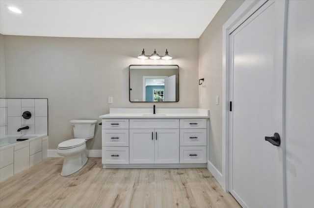 1950 Stethem Fry, Alpharetta, GA 30022 - full bathroom with wood finished floors, vanity, and a bath
