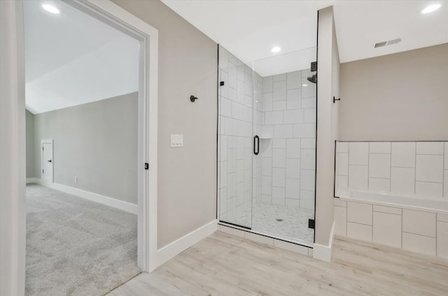 1950 Stethem Fry, Alpharetta, GA 30022 - bathroom with a shower stall, a garden tub, wood finished floors, and recessed lighting