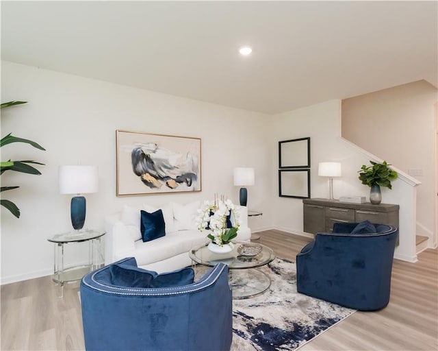 2686 NE Almand Ln NE, Conyers, GA 30013 - living area featuring wood finished floors and recessed lighting